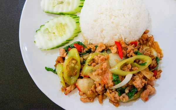 Hot and spicy stir fried holy basil minced pork and fried egg on — Stock Photo, Image