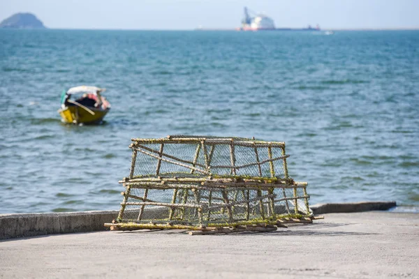 Lobster and crab pots stacked fishing net catching and fishing b — Stock Photo, Image