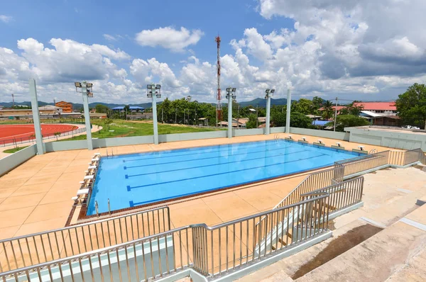 Competitive swimming pool / View on stand outdoors swimming pool