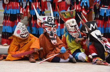 Phi Ta Khon festival Ghost mask and colorful costume Fun Traditi clipart