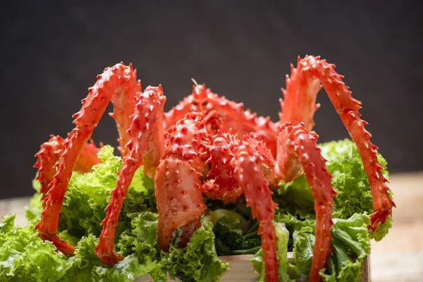 Alaskan King Crab Cooked steam or Boiled seafood and lettuce sal