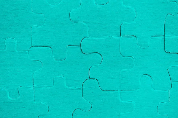 Jigsaws puzzles - blue of Jigsaw pieces on texture background