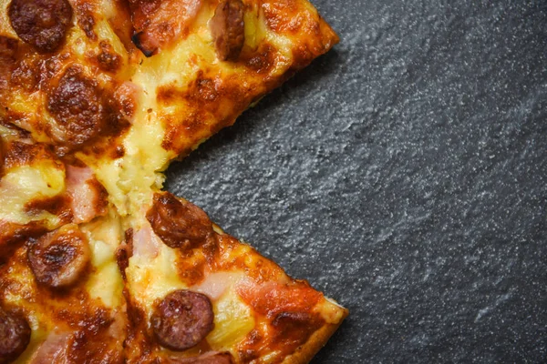 Pizza slice on the dark plate / delicious tasty fast food italia