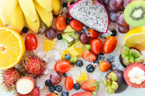 Fruit salad background fresh summer fruits and vegetables health