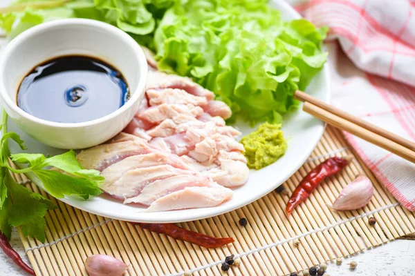 Sashimi raw chicken on white plate with wasabi sauce and vegetab — Stock Photo, Image