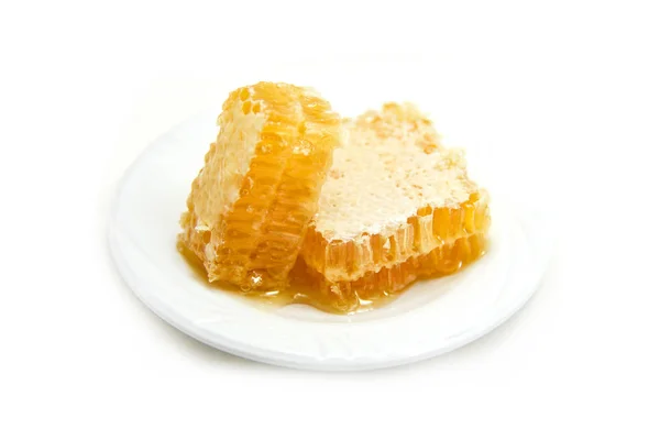 Čerstvý med/blízká žlutá sladká medonosná plátky bílá PLA — Stock fotografie