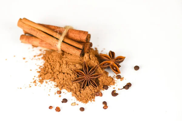 Cinnamon sticks and Star Anise on cinnamon powder herbs and spic — Stock Photo, Image