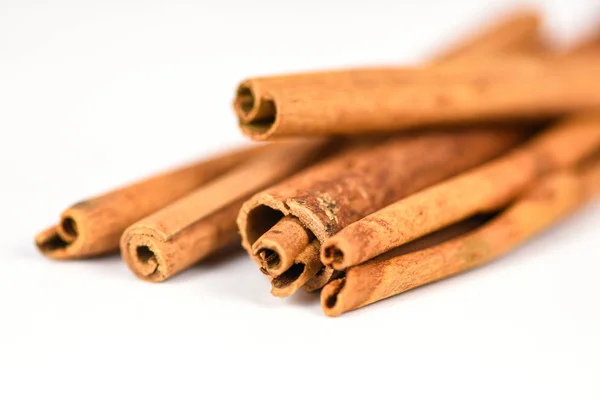 Cinnamon sticks on white background herbs and spices for food — Stock Photo, Image