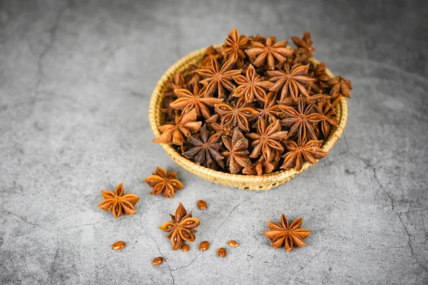 Star Anise in basket on dark background herbs and spices for coo — Stock Photo, Image