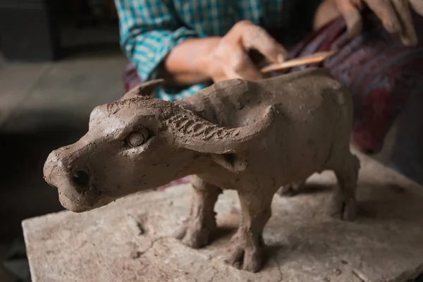 Practice Molding clay is buffalo by Government agency, Thailand