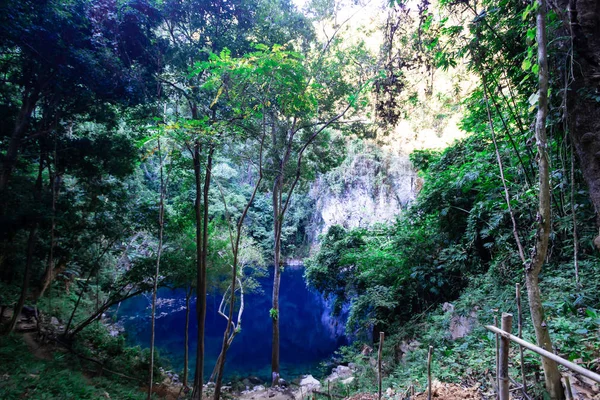 natural fountain or subterranean course of water on crater Beautiful like emerald green in lampang Thailand