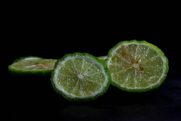 Bergamot Kaffir Lime Cut Half Isolate Black Background — Stock Photo, Image