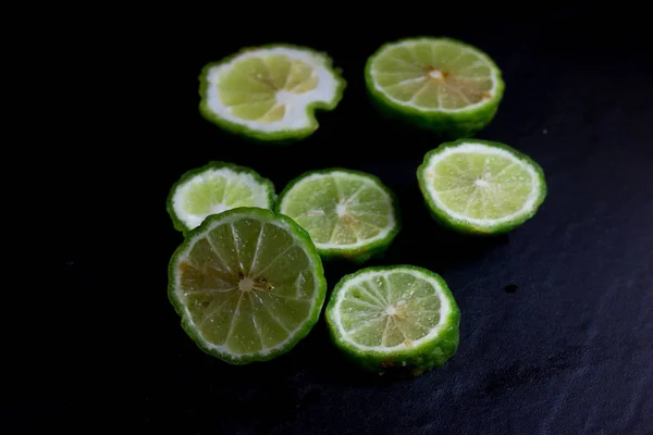 Bergamot Kaffir Lime Cut Half Isolate Black Background — Stock Photo, Image