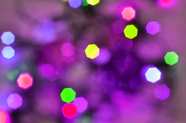 Christmas background. Glowing and festive colored light circles created from in camera — Stock Photo, Image