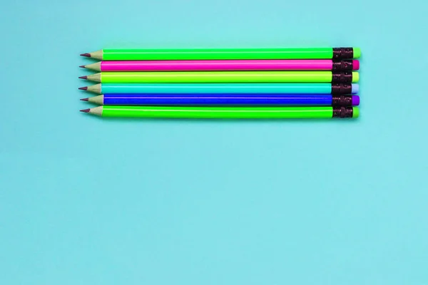 Simple pencils neon color. office supplies for study. subject: back to school. place for text. — Stock Photo, Image