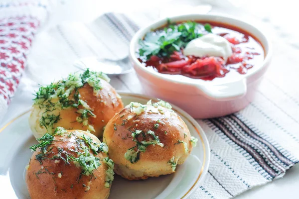 Garlic bread with the soup on a white background — Stock Photo, Image