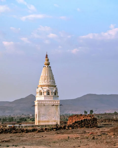 Isolated image of a small temple outside Tarde village in Pune district of Maharashtra, India.