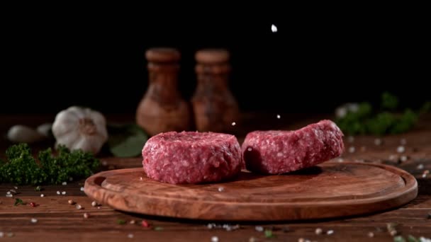 Super Slow Motion Footage Strewing Salt Herbs Fresh Raw Beef — Stock Video