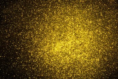 Noel ve yeni yıl arka plan koyu duvar üzerinde parlak altın yıldız ile