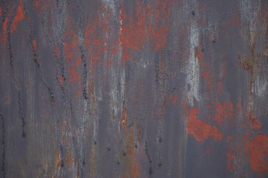 Çok renkli arka plan: boyalı dökülüyor ve doku çatlama ile metal bir yüzeye