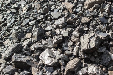 Doku arka plan için doğal siyah sert kömür yığını. Sınıf antrasit kömürler genellikle taş kömür ve siyah elmas kömür olarak anılacaktır.