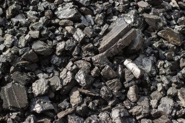 Doku arka plan için doğal siyah sert kömür yığını. Sınıf antrasit kömürler genellikle taş kömür ve siyah elmas kömür olarak anılacaktır.