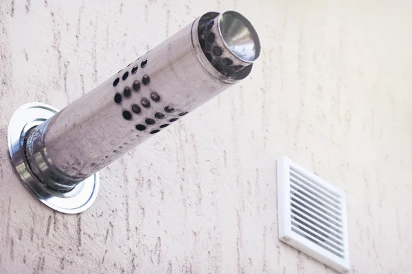 Munich plaster wall with gas chimney and ventilation hole — Stock Photo, Image