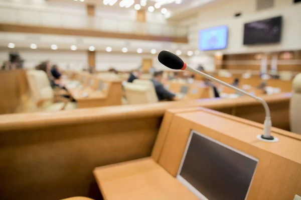 Conference room or seminar meeting room in business event. Session of Government. Academic classroom training course in lecture hall. blur abstract background. working in modern bright office indoor