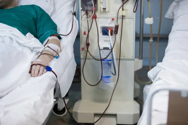 A hospital patient with an intravenous drip