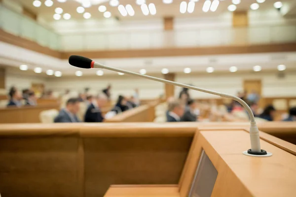 Conference room or seminar meeting room in business event. Session of Government. Academic classroom training course in lecture hall. blur abstract background. working in modern bright office indoor