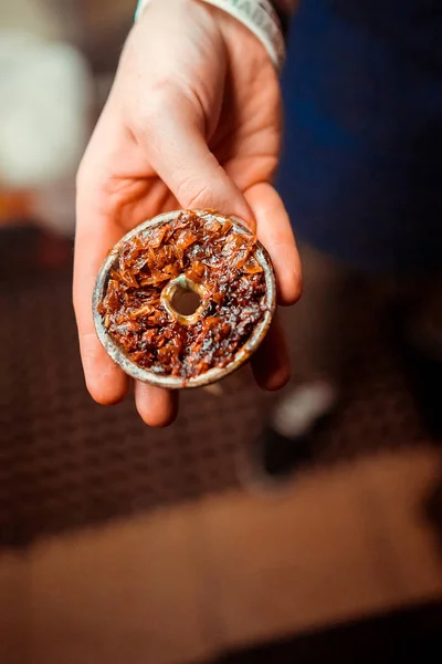 Hookah bowl, with tobacco stuffed into it