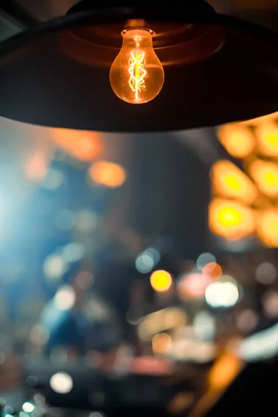 Warm lighting modern ceiling lamps in the cafe and interior decoration restaurant.