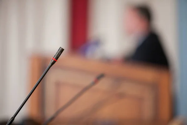 Detail with three press conference microphones