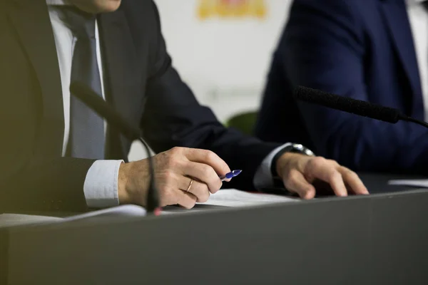 Press interview. Hand gesture. Businessman or politician.