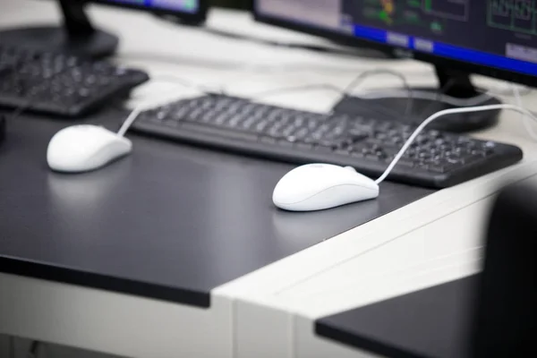 computer behind the glass in a modern office