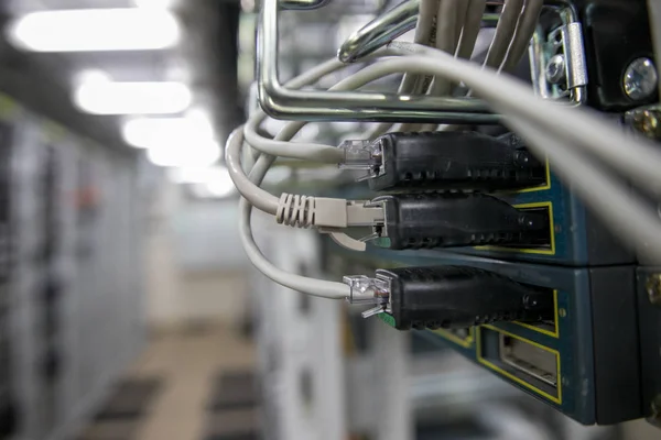 Fiber Optical connector interface. Fibre Channel swich. Severs computer in a rack at the large data center.