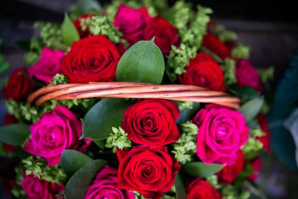 Flowers lie on a granite monument, laying flowers on the day of remembrance and mourning.