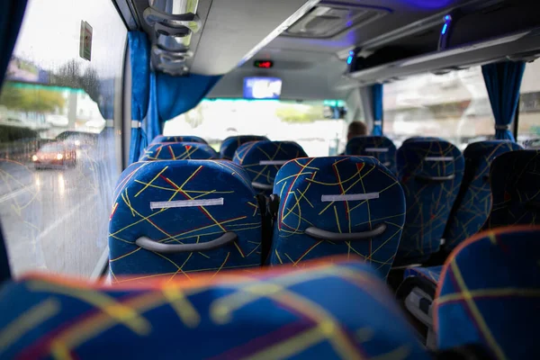 Blue comfortable seats in a luxury bus