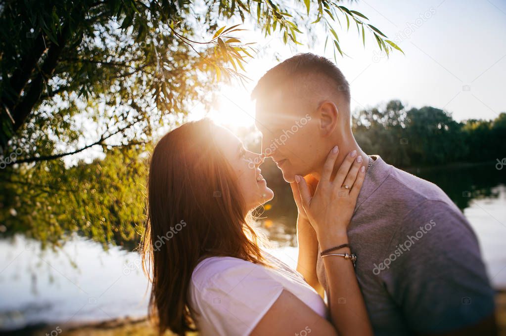 young couple in love posing on outdoor photo - session 