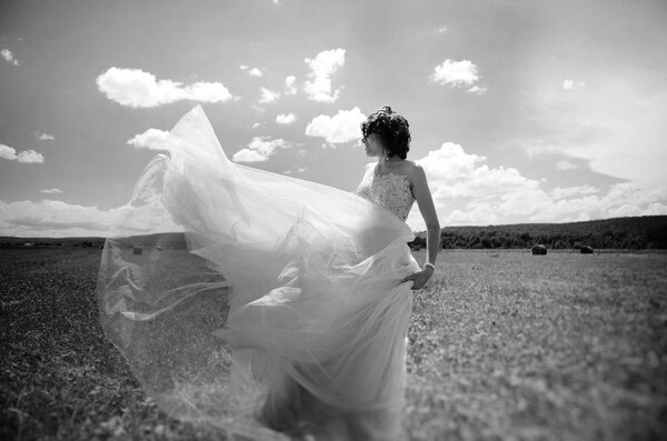 Black and white photo of young beautiful bride