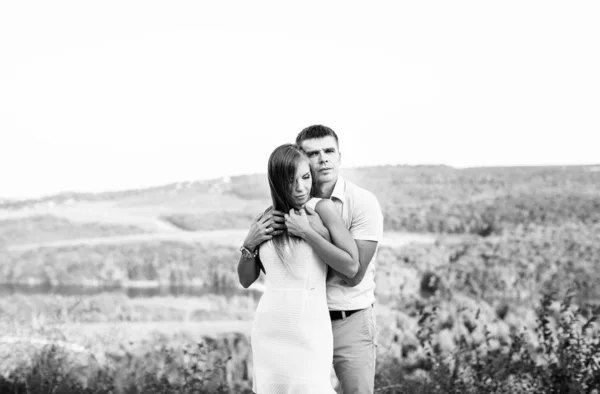 couple in love on a walk in the summer in the mountains