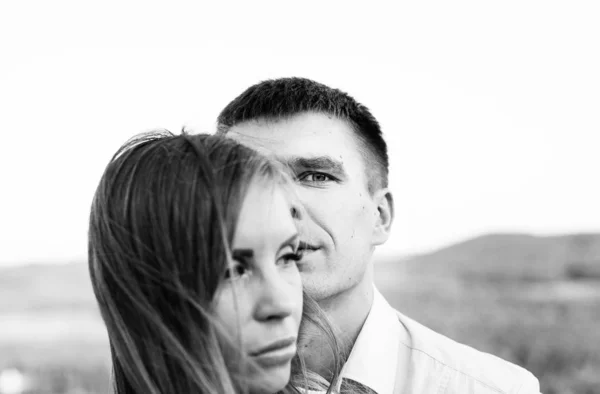 couple in love on a walk in the summer in the mountains