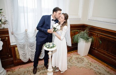 kayıt sırasında gelin ve damat, yüzük değişimi 