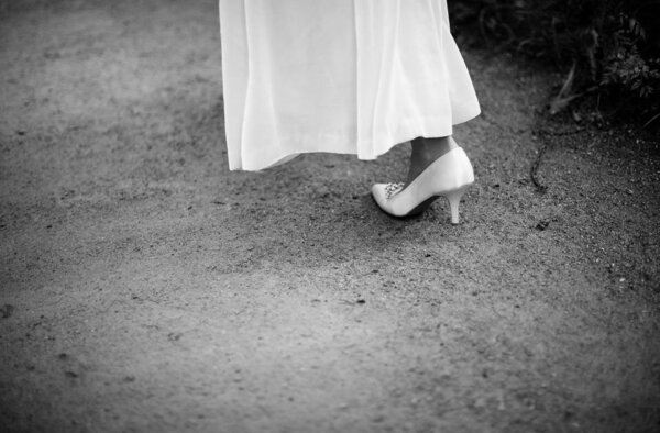 White stylish wedding shoes, black and white photo