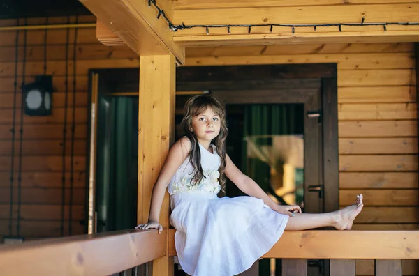 Pretty Little Girl Posing Wooden Terrace — Stock Photo, Image