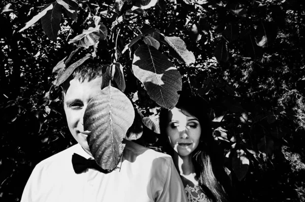 Happy young bride and groom. Black and white photo