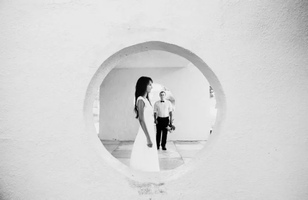 Happy young bride and groom. Black and white photo