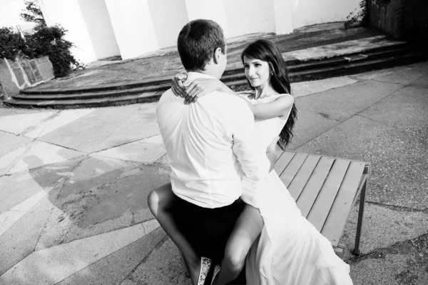 Happy young bride and groom. Black and white photo