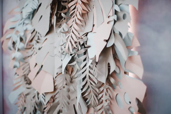 cutted out paper leaves as wedding decorations