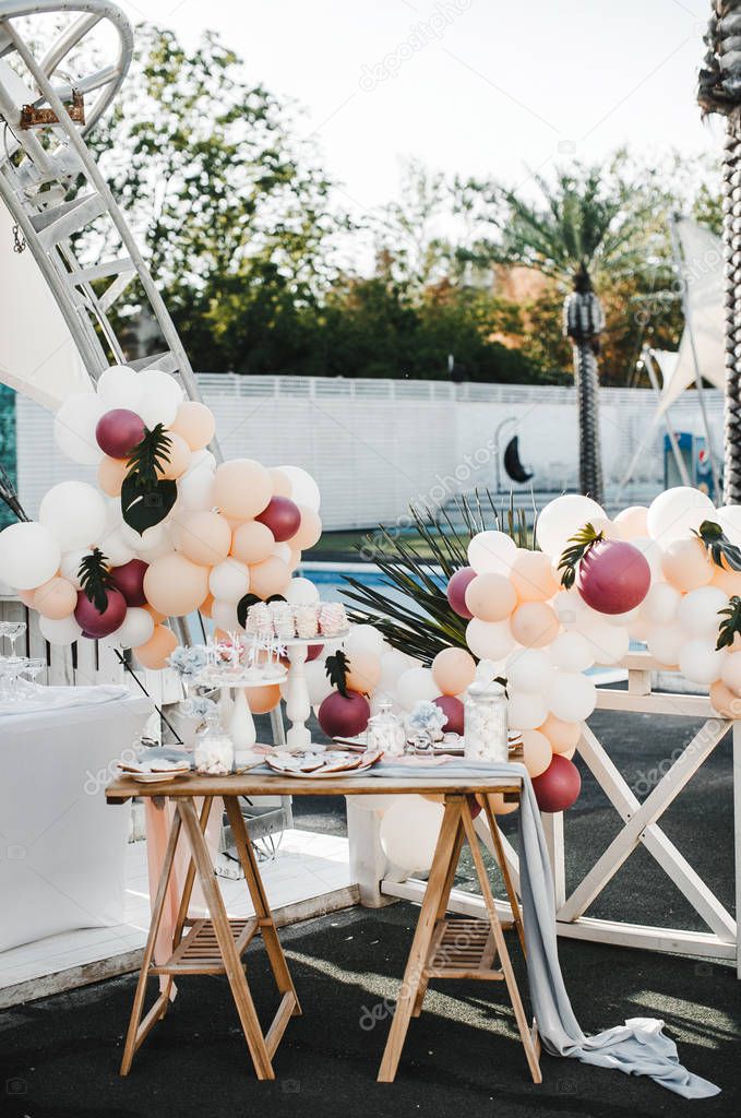 wedding table with pastry in pastel colors 
